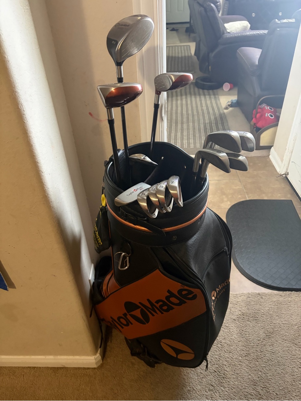 TaylorMade Black and Orange Golf Bag with Clubs